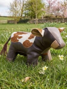 Brown Cow doorstop multi brown cowhide
