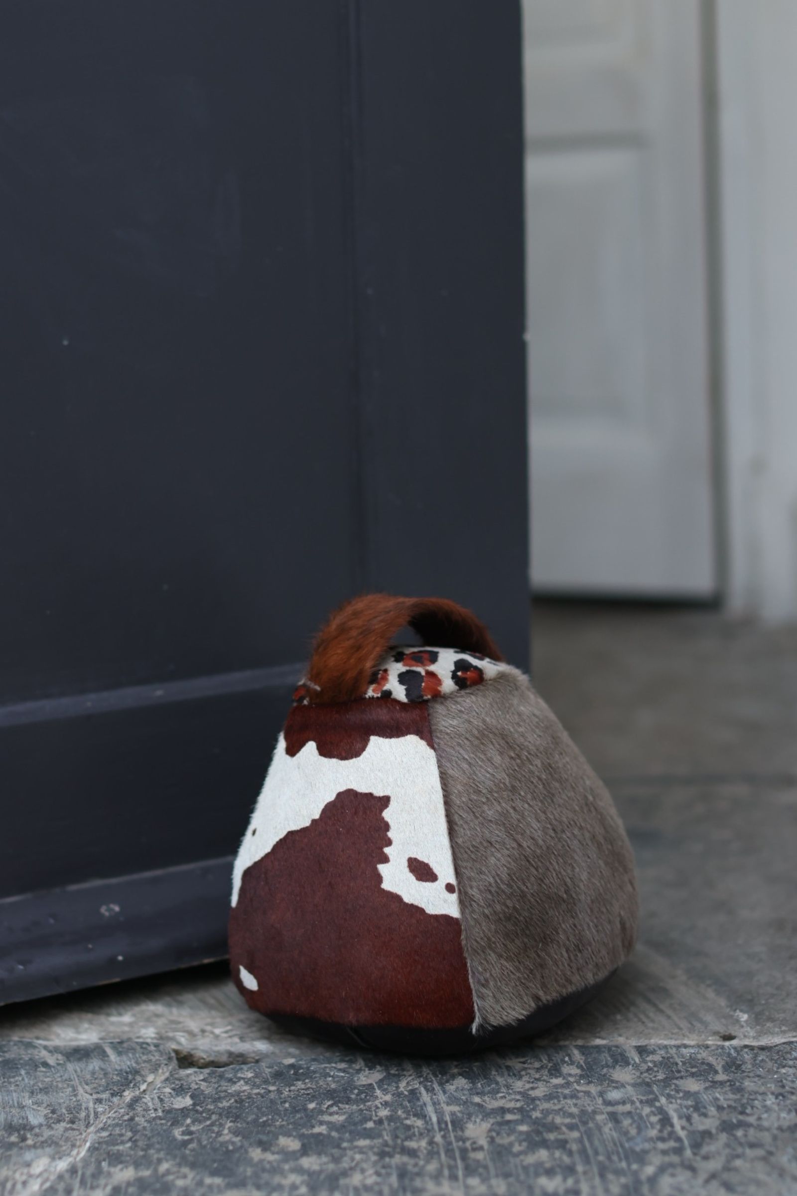 Cowhide doorstop multi browns XL chairman
