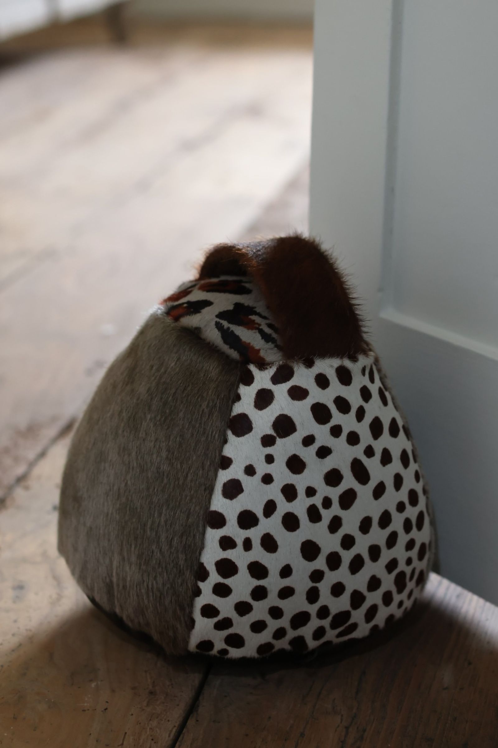 Cowhide doorstop multi browns XL chairman