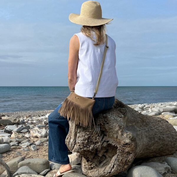 Fistral Oatmeal Suede Fringe crossbody by Owen Barry (1)