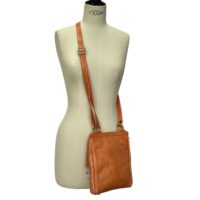 Flora Pumpkin (2) Leather crossbody bag flora in Pumpkin by Owen Barry